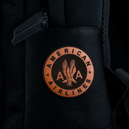 Genuine Leather American Airlines Patch Applied to a Black Backpack